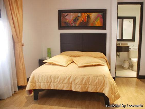 Hotel American Deluxe Bogotá Habitación foto